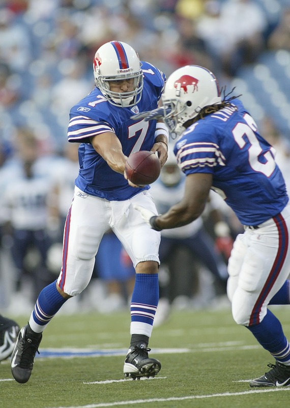 AP Photo - J.P. Losman and Marshawn Lynch